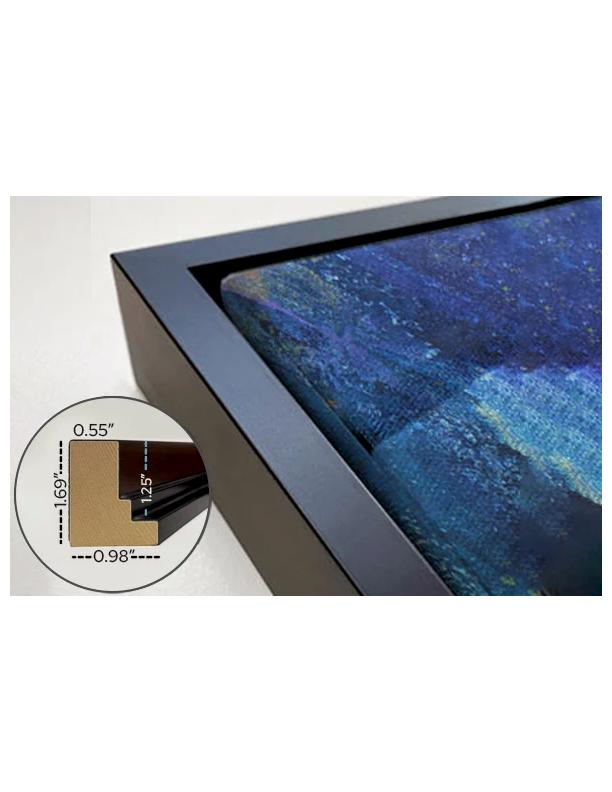 a close-up view of a framed artwork with a dark blue and black color palette, possibly depicting a night sky or a landscape.