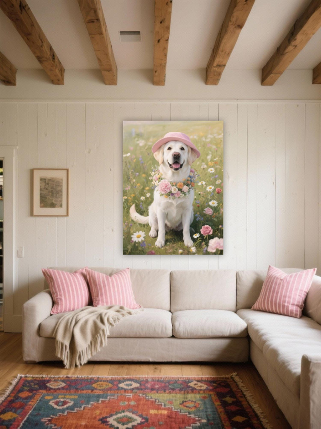 a cozy living room with a large, cheerful dog sitting in a field of flowers, wearing a pink hat. The room has a beige sofa with pink and white striped pillows, and a colorful rug on the floor. A large framed picture of the dog is displayed on the wall above the sofa.