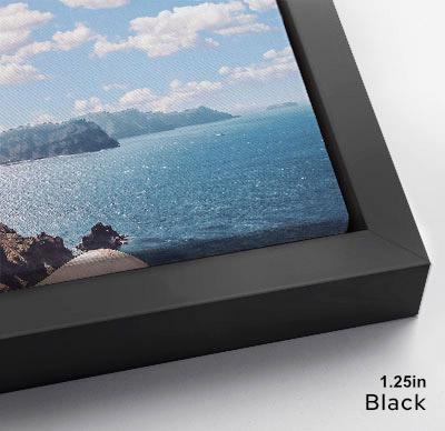 The image is a framed photograph of a scenic ocean view with mountains in the background.