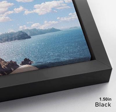 The image is a framed photograph of a scenic ocean view with mountains in the background.